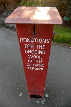 Metal brown donation box, Botanical Gardens, Christchurch, New Zealand