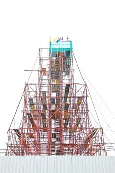 Temporary scaffold for construction works at building site.