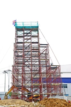 Temporary scaffold for construction works at building site.