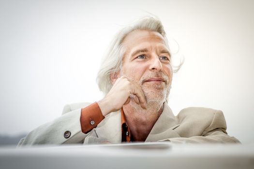 An image of a man in suit outdoor