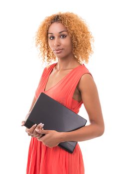 young woman in a red dress holding a laptop