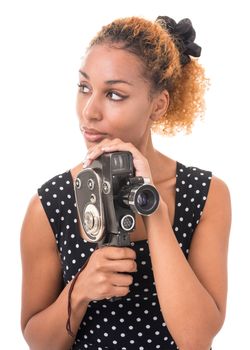 portrait of a young woman with a camera in hand, in a retro style