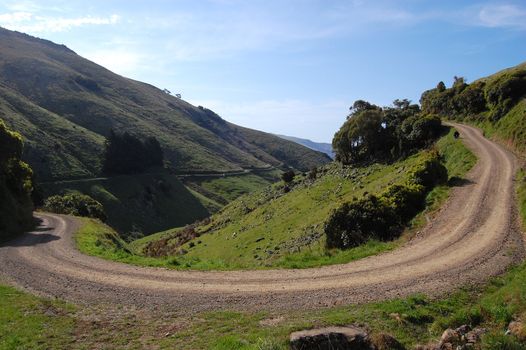 Gravel road in farm area, Banks Peninsula, New Zealand