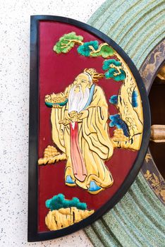 Chinese temple golden window with chinese symbolic drawing