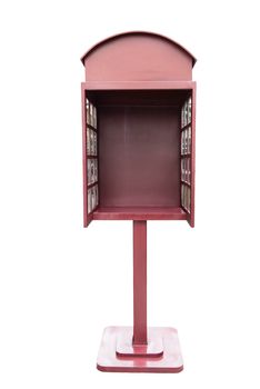 Wooden empty public telephone booth, taken on a sunny day