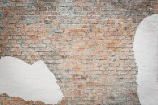 Brown brick wall with white painted concrete pattern, useful for background design