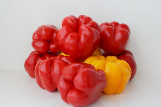 Image of red and yellow raw pepper
