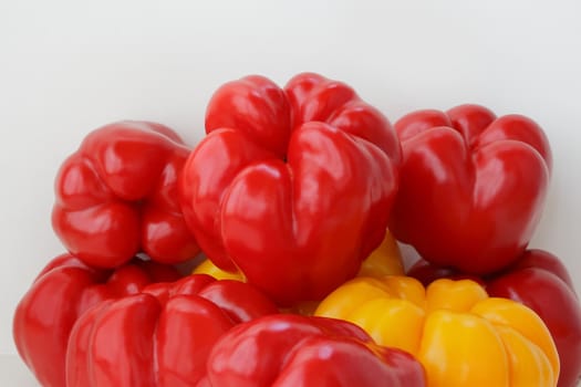 Image of red and yellow raw pepper