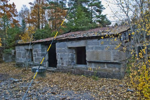 do not know what the house used to but i would guess it's been some sort of tool shed one time, the house is located right by the sea at iddefjord in halden, are built of large granite blocks, falling soon in together and looking rather ghostly from the sea