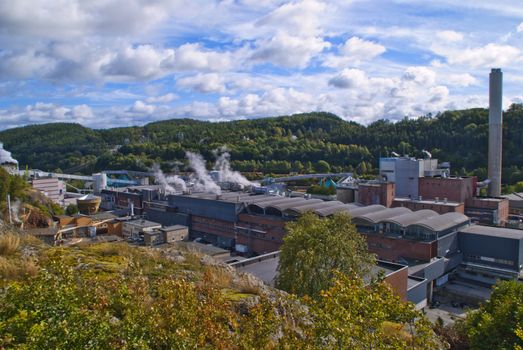 paper mill in Halden (Norway) which is the oldest wood processing plant in Norway, image is shot from a mountain near the factory.