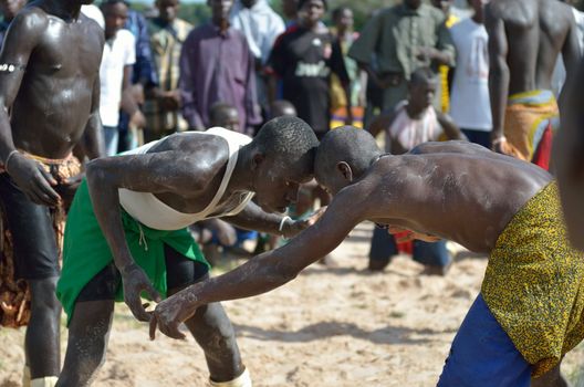 Kartiak, Senegal- September 27,2012: Men in the traditional struggle of Senegal, this sport is the most ancient competitive discipline in Senegal, this sport is the most beloved in Senegal