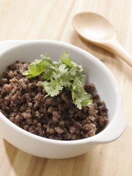 close up of a bowl of minced beef