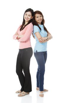 Full body shot of two young women wearing casual clothes