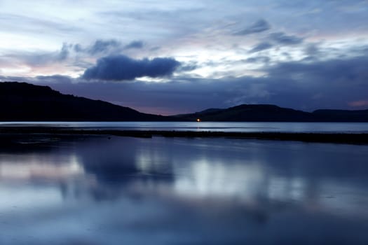 Twilight on the beach at Lyme Regis