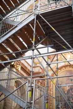 VIENNA - OCTOBER 5: The St. Charles' Church (Karlskirche) in Vienna is undergoing major renovations on October 5,2012 in Vienna, Austria . As a benefit for its visitors, a comfortable elevator plus additional 120 stairs lead to the highest point of the church, bringing the visitor very close to the frescos and architecture of the church.