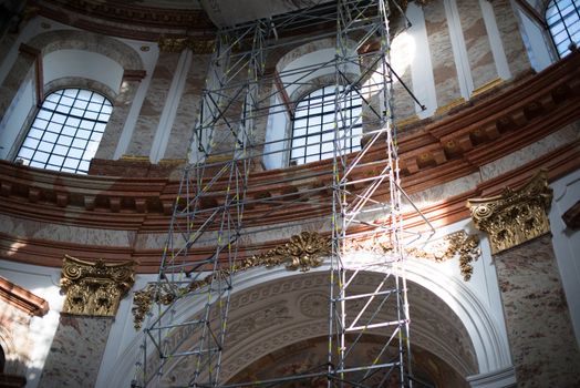 VIENNA - OCTOBER 5: The St. Charles' Church (Karlskirche) in Vienna is undergoing major renovations on October 5,2012 in Vienna, Austria . As a benefit for its visitors, a comfortable elevator plus additional 120 stairs lead to the highest point of the church, bringing the visitor very close to the frescos and architecture of the church.