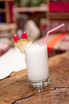 Pinacolada milk cocktail on table in restaurant