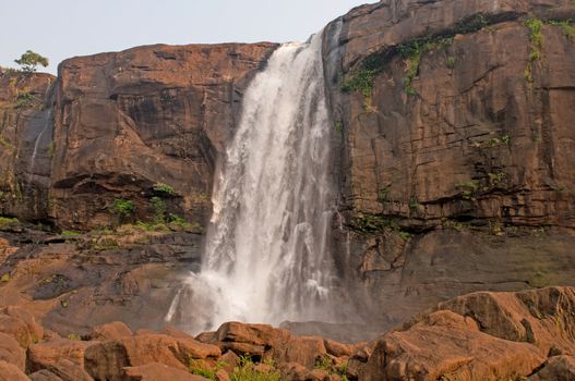 Sun beautifully lighting the athirampalli falls in Kerala