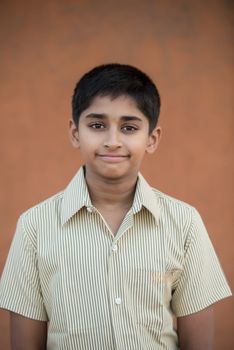 Handsome Indian toddler ready to go to school