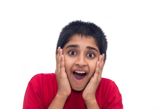 An handsome indian kid looking very excited