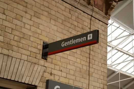 gentlemen sign of toilet at railway station
