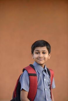 Handsome Indian toddler ready to go to school