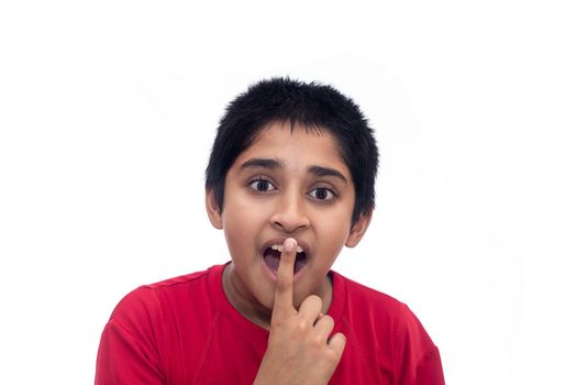 An handsome indian kid looking very excited