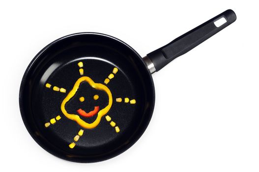Funny healthy vegetables on a frying pan