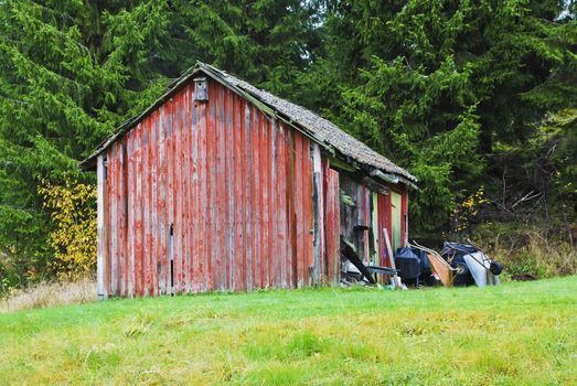 the house is just by the road that goes to aspedammen which is a small village outside halden, the house looks like it might fall in together anytime, image is shot in october 2012.