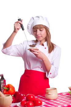 beautiful woman tries to cooked food, cooking vegetables