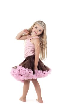 Shot of little girl with long blond hair in studio