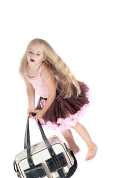 Little girl with bag in studio