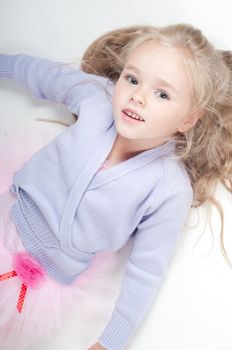 Studio shot of ballet dancer girl in blue