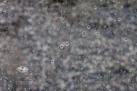Water drops on window glass after rain