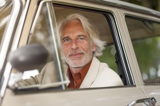 An image of a man in suit outdoor