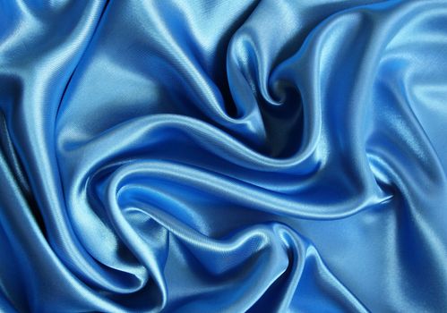 Smooth elegant dark blue silk can use as background Smooth elegant dark blue silk can use as background