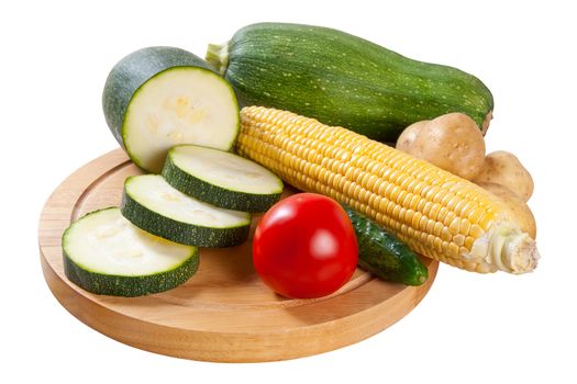 Whole and sliced different vegetables isolated on white backround