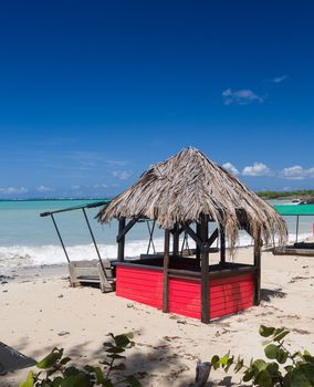 Sand swamps and buries table and chairs at bar on Friar's beach St Martin Sint Maarten