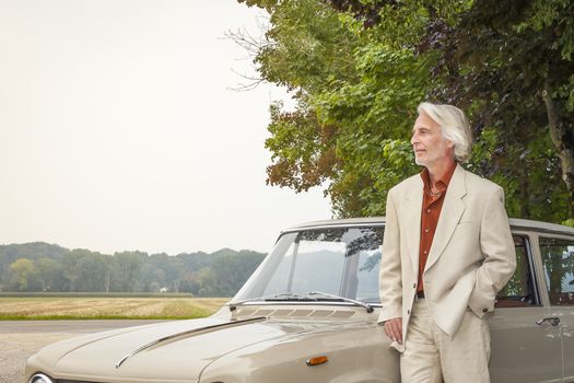 An image of a man in suit outdoor