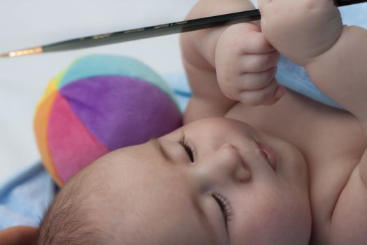 Little artist with a brush in his hand







Little artist