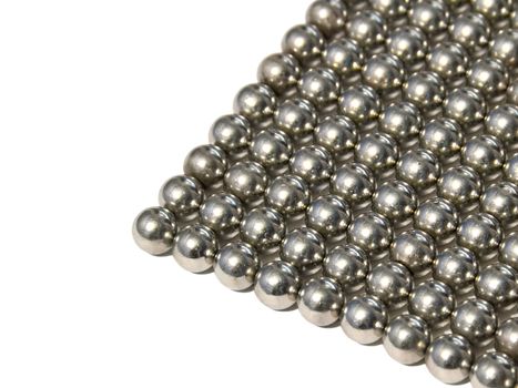 steel balls arranged in rows isolated on white background