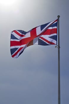 Great britain flag with blue sky behind