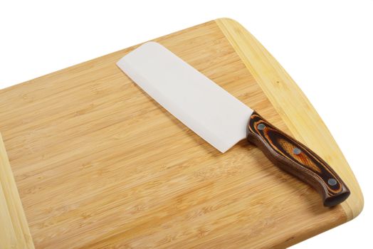 Wooden cutting board with a kitchen knife. Isolated on white.