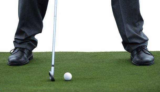 golf stance on green carpet