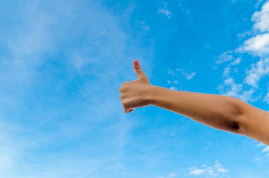 Hand and finger isolated on blue sky