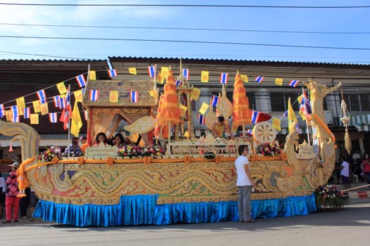 SURAT THANI, THAILAND - OCTOBER 31 : One of several decorated ceremonial boats in Tak Bat Devo and Chak Phra Festivals on October 31, 2012 in Surat Thani, Thailand.