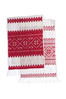 National Ukrainian traditional ornate craftsmanship symbol embroidery in red cross-stitch handmade white towel with ornamental pattern isolated