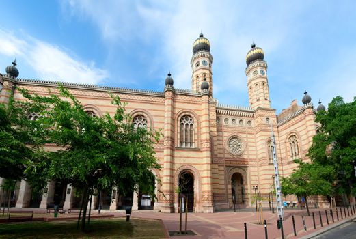 Perspective view on entrance to landmark ornate Jewish temple Great synagogue Moresque style by Ludwig Forster on Dohany street in Pest district Budapest Hungary