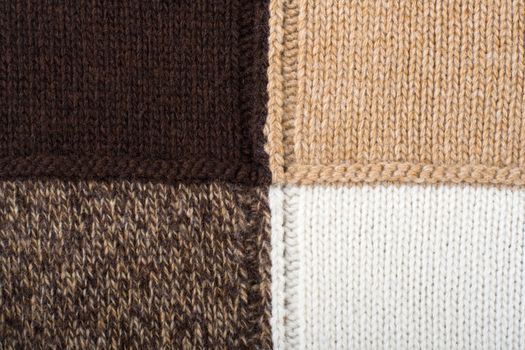 Knitted textile from four beige, white, brown and speckled brown patterns Backgrounds Abstract