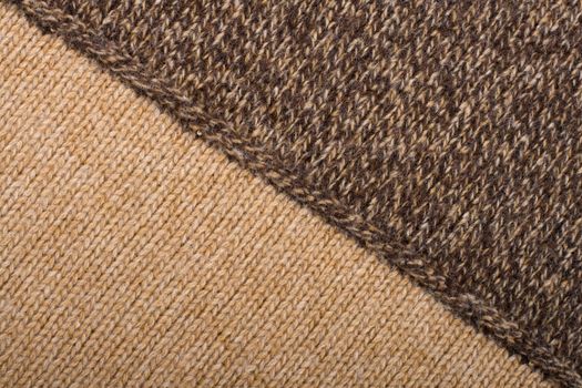 Knitted textile from two light and dark brown patterns Backgrounds Abstract